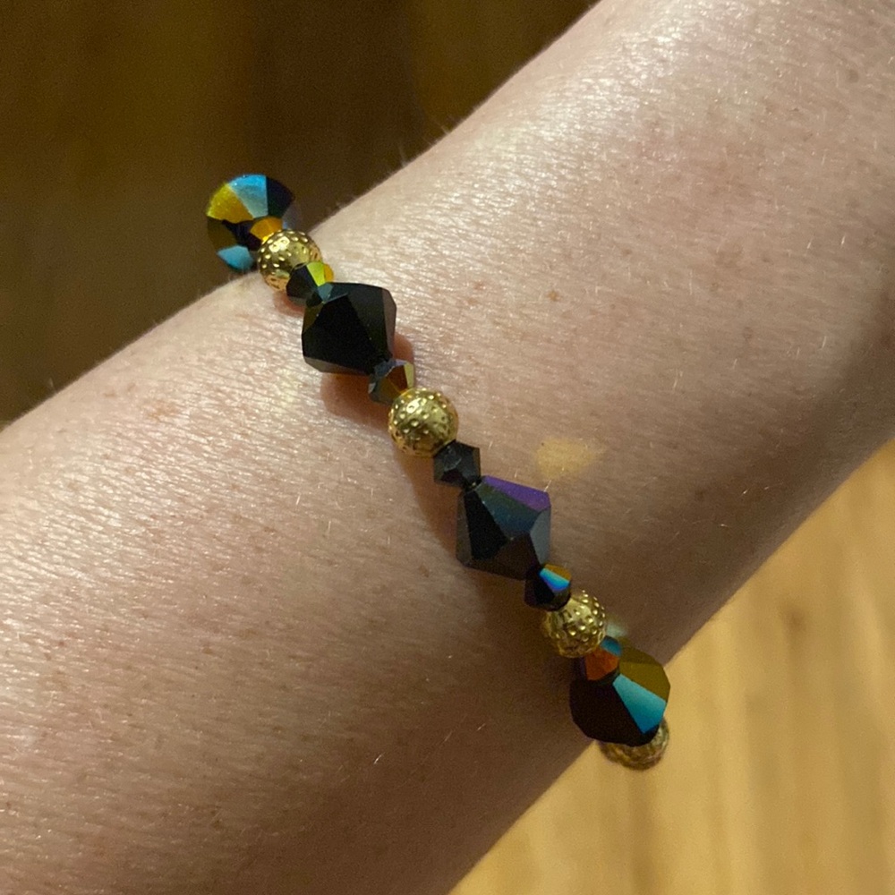 Alex and Ani dark blue and gold get and bead bracelet